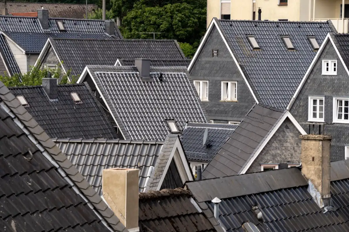 Steep roof eaves and gutter lines on houses in Columbia, MO