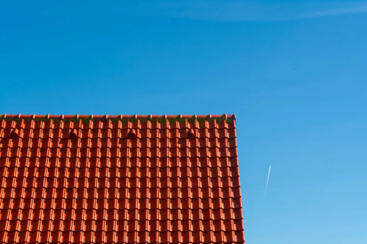 Tile roof gable in full sun, the kind of exposure that sets roof life in Columbia, MO